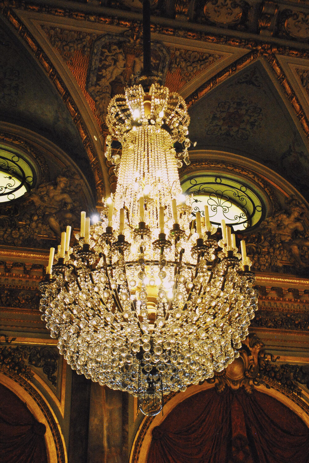 Amazing huge chandelier at The Breakers mansion in Newport, Rhode Island. Amazing huge chandelier at The Breakers mansion in Newport, Rhode Island.